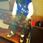 Styling On Them Lames: Wale In An OG BBC Ice Cream Varsity Jacket & Air Jordan 5 “Tokyo 23″ Sneakers