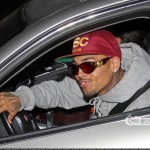 Passion For Fashion: Chris Brown Wearing Versace Shades & A Grey Bape Hoodie