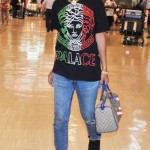 Rihanna Arrives In Tokyo Wearing A Versace “Palace” Tee-Shirt, “Golden Moments” Air Jordan 6 & Carrying A Gucci Bag
