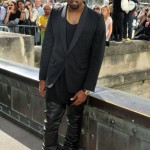 Kanye West Attends Christian Dior Fashion Show In Paris Wearing A Pair Of  Air Jordan 1 “Bred” 