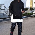 Kanye West Styling In An $800 Balmain Hoodie Paired With $180 Patta x KangaROOS Woodhollow Heritage Hiking Boots