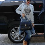Rocking Street Gear: Rihanna Wears A $218 Coal N Terry Vintage Massive Denim Jacket & J Brand Aiden Boyfriend Jeans