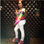 Tiny Wears A Color-Blocked Sweater Paired With $895 Giuseppe Zanotti Wedge Sneakers
