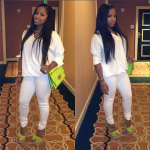 Toya Wright Goes Bright & White In $895 Giuseppe Zanotti Ankle Strap Bow Sandals And A $795 Michael Kors Gia Chain-Strap Flap Bag