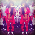 Teyana Taylor Looks Dope In A Custom Made Red Leather Jersey & $595 Givenchy Printed Silk-Twill High-Top Sneakers