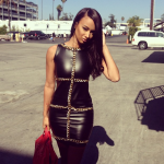 Draya Wears A Black Leather Dress Designed By Russia Paul & Carries A $2,340 Givenchy Nightingale Bag