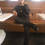 Diggy Simmons Outfitted In A Marcelo Burlon County Of Milan Tonal-Patches Nylon Bomber Jacket, Ksubi Jeans & “Black” adidas Originals x Yeezy Boost 750