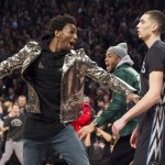 Passion For Fashion: Andrew Wiggins Wears A Giuseppe Zanotti Metallic Python Biker Jacket During The NBA All-Star Weekend