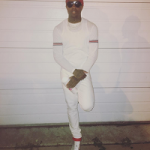 Lil Durk Wears A Gucci White Crew Long-Sleeve T-Shirt & Metallic Leather High-Top Sneakers