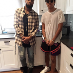 NFL Fashion: Odell Beckham Jr. Styles In A Mike Amiri Lace Up Plaid Shirt & Fear Of God Military High Top Sneakers