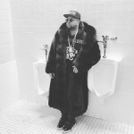 The Dream Poses In A Full Length Fur Coat And Gucci Blind For Love ‘Tiger’ Sweatshirt