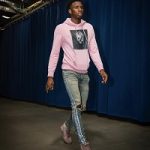 NBA Style: Hamidou Diallo Wears An Alexander McQueen Printed Loopback Cotton-Jersey Hoodie, Amiri Track Dirty Indigo/Silver Jeans & Christian Louboutin Men’s Louis Flat Suede Sneakers