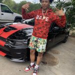 Mikey Williams Outfitted In A BAPE Color Camo Pullover Hoodie, El Capitan Cartel “A Leader” Dead Fresh Crew Camo  Shorts, And Nike Air Jordan 1 Retro Chicago Sneakers
