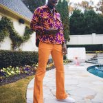 Jaren Jackson Looks Dapper In A Jacquemus Le Blouson Montagne Printed Jacket And Raf Simons Orange Twill Flared Trousers