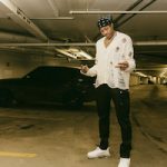 NBA Player Scottie Barnes Jr. Dressed In A MNML Distressed Cardigan, Cargo Pants And Balenciaga Triple S Clear Sole Low Top Sneakers