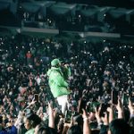 Are You Feelin It Or Nah? Lil Baby Performs In A Supreme New York Yankees GORE-TEX 700-Fill Down Jacket And Bottega Veneta Puddle High Boots