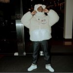Roddy Ricch’s Moncler Genius Faux Shearling Jacket And Nike x Louis Vuitton Air Force 1 Low Sneakers